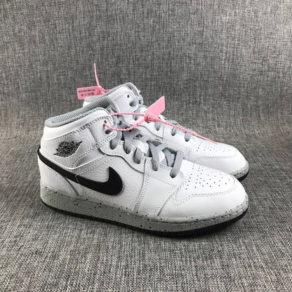 Pair of white and black high-top Jordan sneakers shown from a front three-quarter angle.