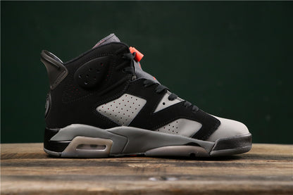 Side profile highlighting the perforated grey panels, black overlays, grey midsole, and visible heel air unit.