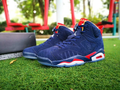 Pair of navy high-top sneakers shown from a three-quarter front angle.