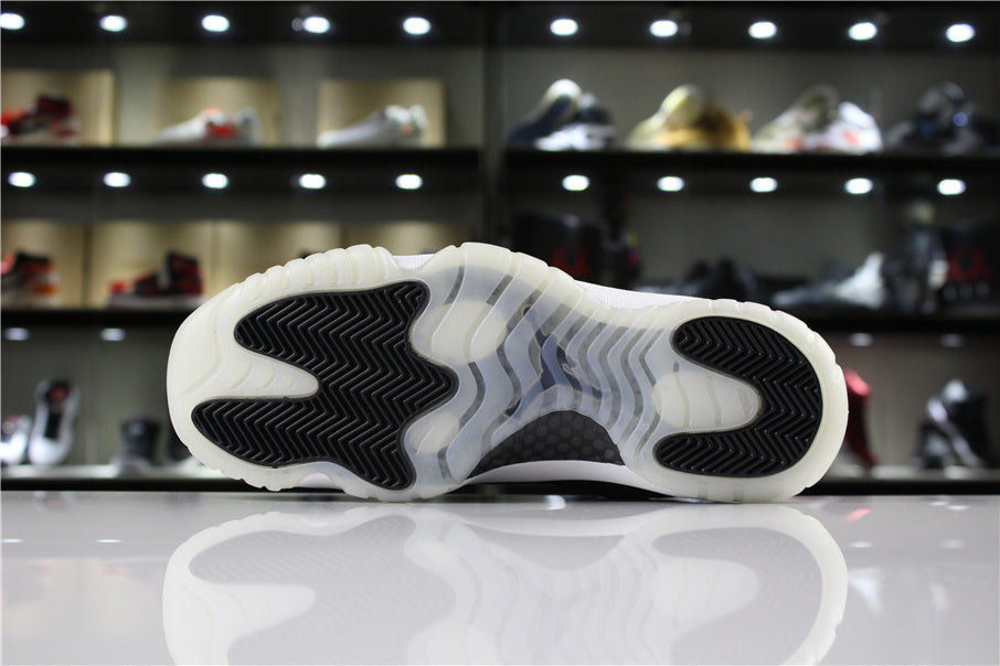 Full outsole view showing translucent rubber, black herringbone traction sections, and a textured central panel.