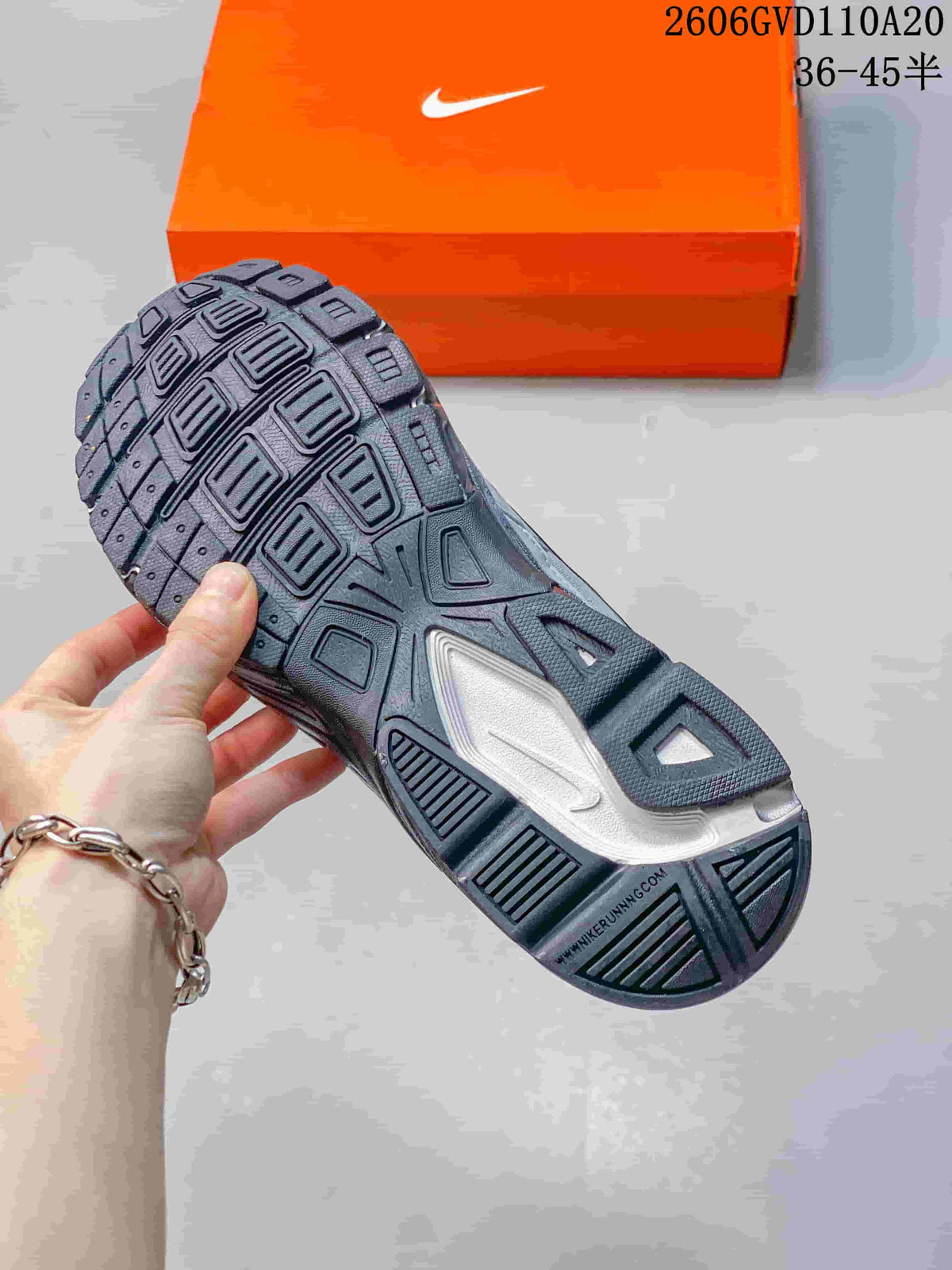 Nike Initiator Low-Top Sneakers in Silver and Black