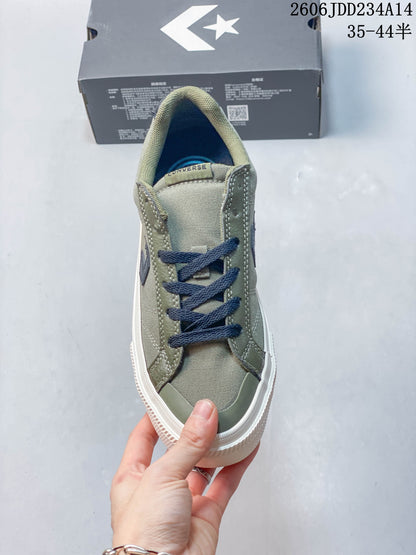 Converse Low-Top Lace-Up Sneakers in Olive and Navy