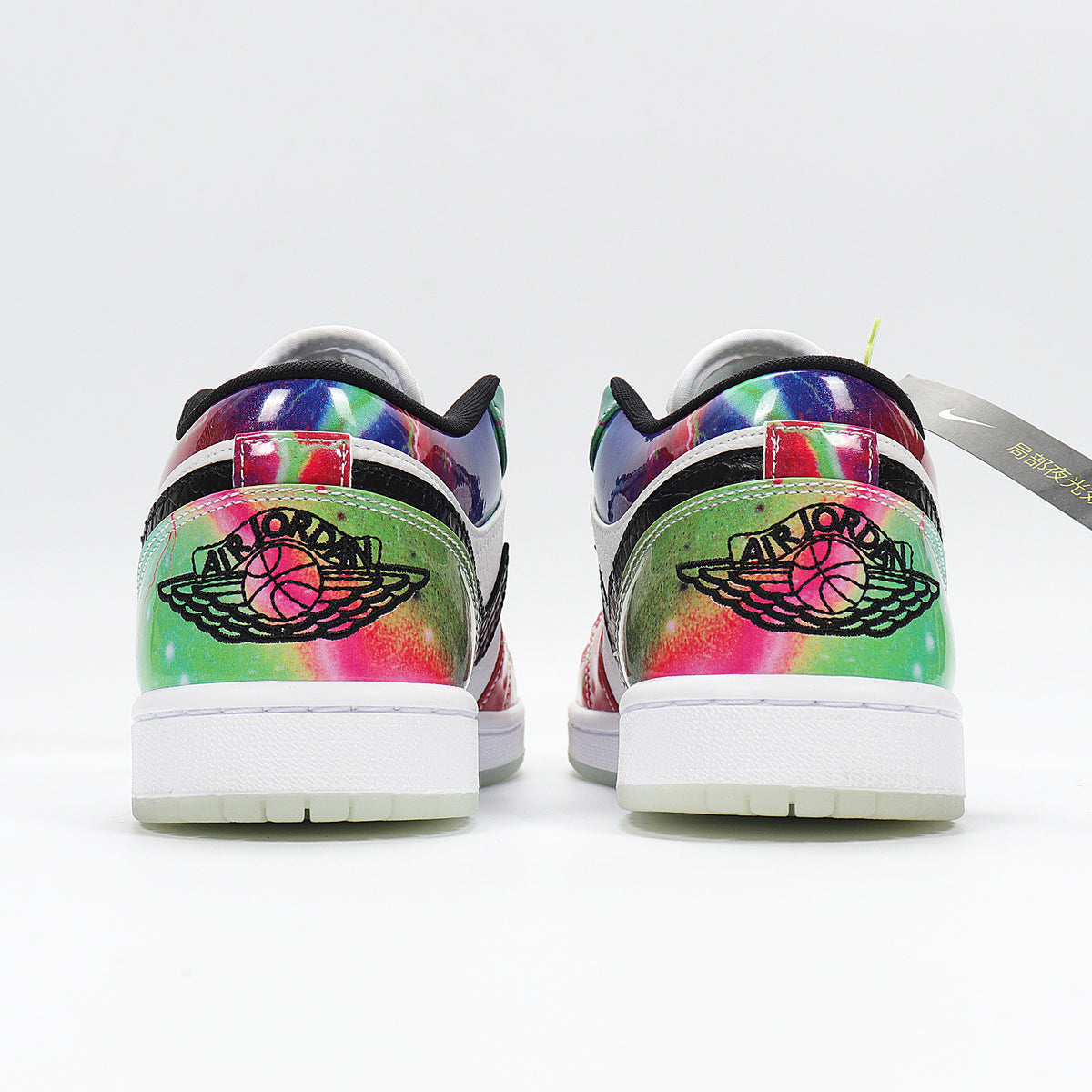 Rear view showing colorful heel panels and winged basketball logo graphics.