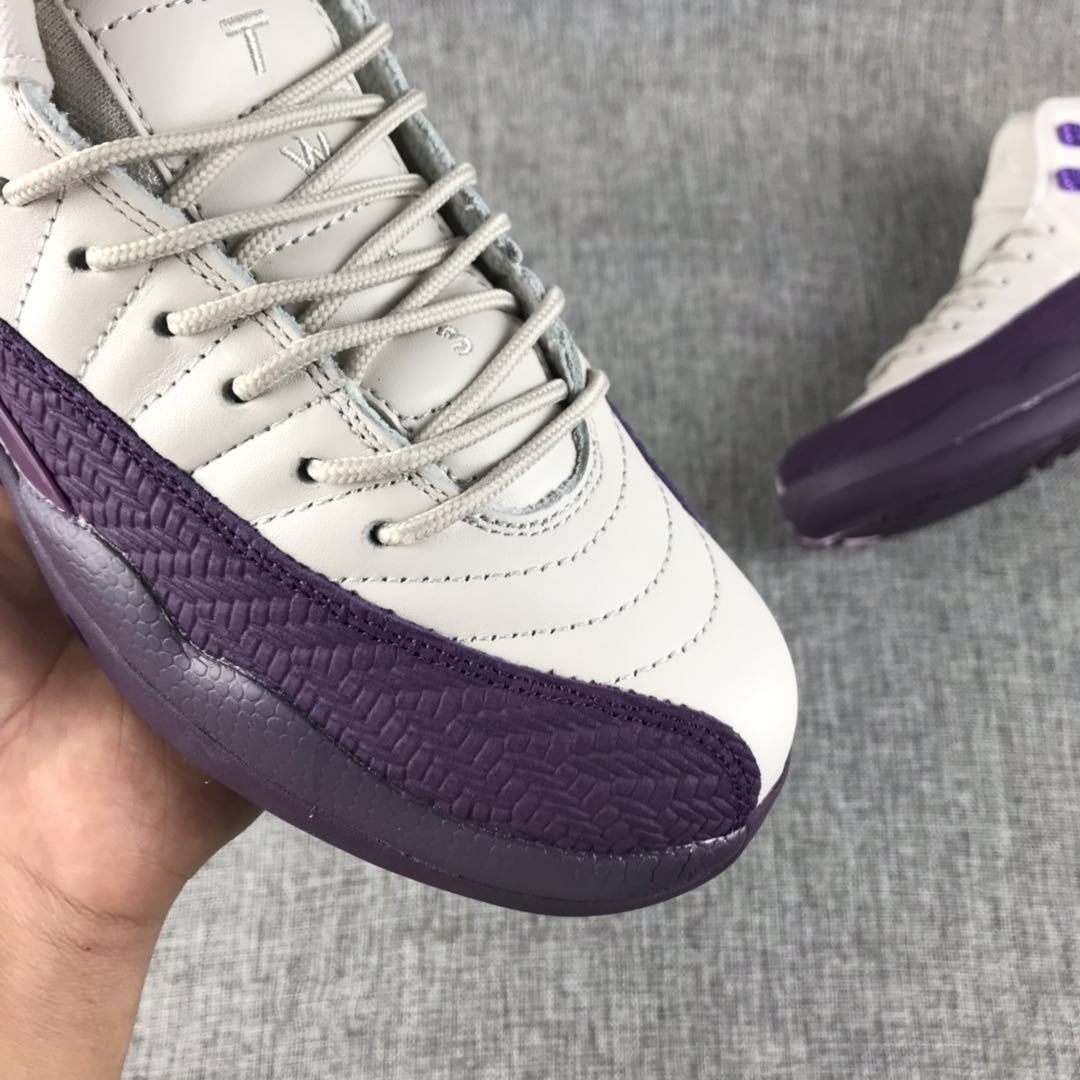 Close-up of the laces and textured purple side overlay