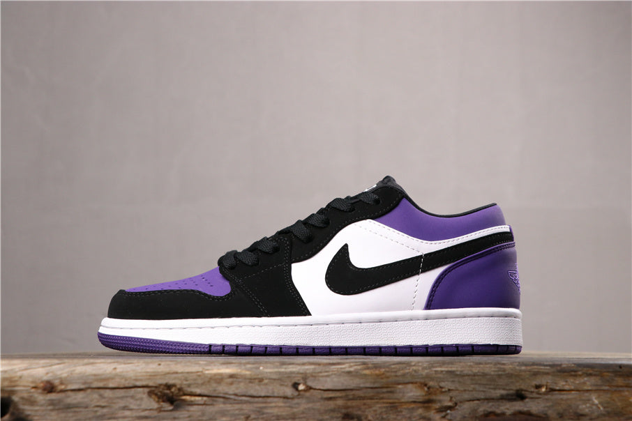 Opposite side profile showing the black and purple upper, white side panel, and purple outsole.
