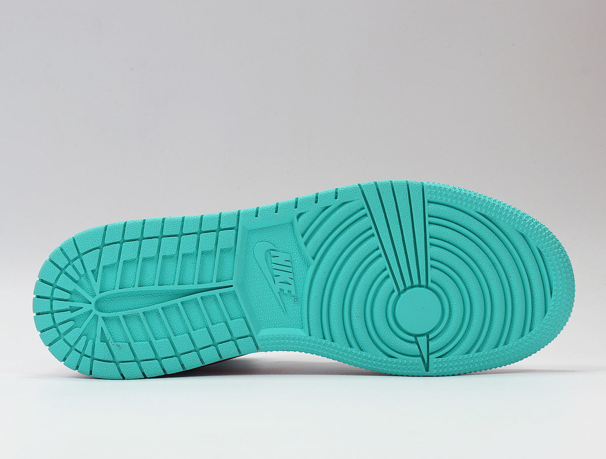 Underside view showing the aqua rubber outsole and circular traction pattern.