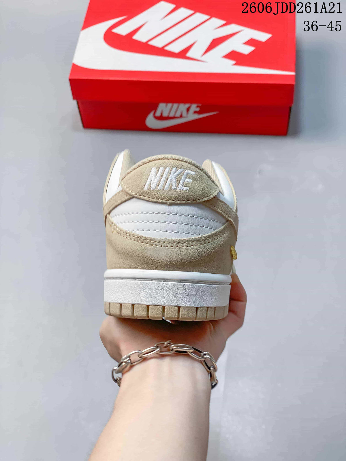 Nike Dunk Low Sneakers in White and Beige