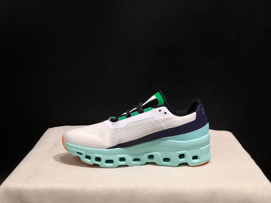 On Cloudmonster Running Shoes in White and Aqua