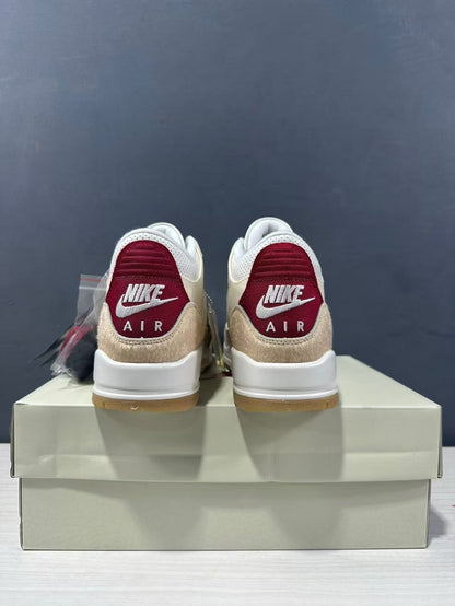 Rear view of the pair showing red heel panels with white Nike Air branding.