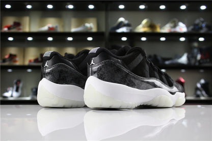 Rear three-quarter view of the pair, highlighting black heel panels, white midsoles, and translucent outsole sections.