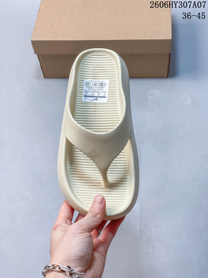 Nike Calm Slide Thong Sandals in Cream