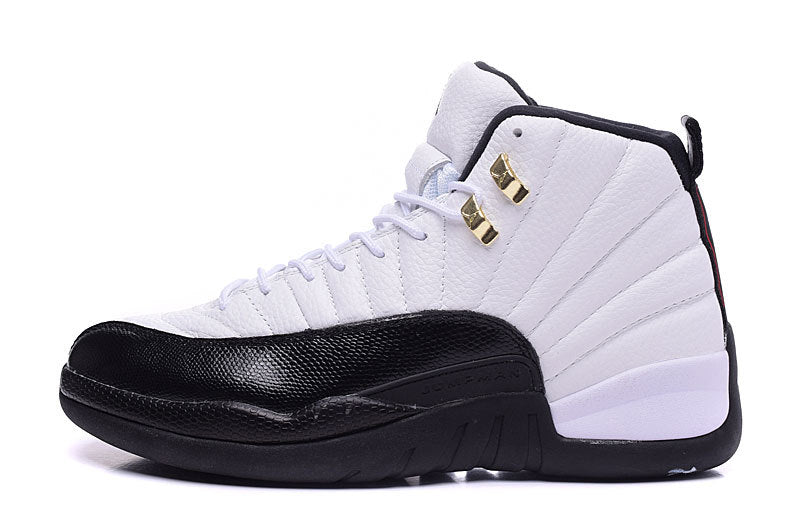 Single side profile showing the white upper, black mudguard and outsole, and Jordan 12 panel construction.