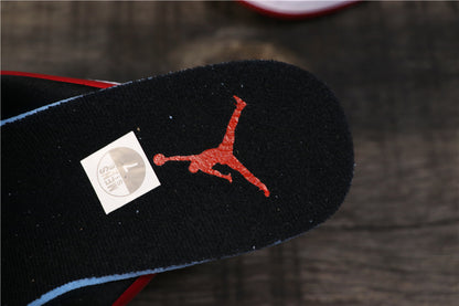 Close-up of a black insole with red Jordan branding and a small size sticker.