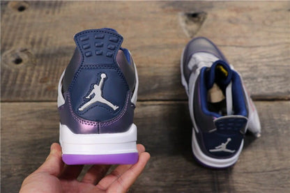 Rear view showing the Jordan heel logo, dark blue heel section, white midsole, and purple outsole.