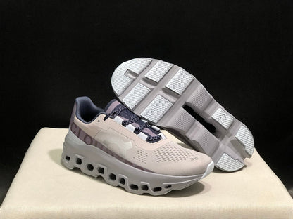 On Cloudmonster Sneakers in Gray and Purple
