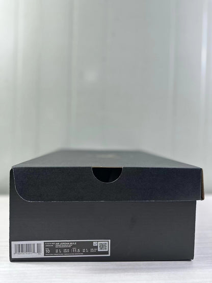 Black shoebox showing the FJ1214-400 Air Jordan Mule label and a photographed size 44 sample.