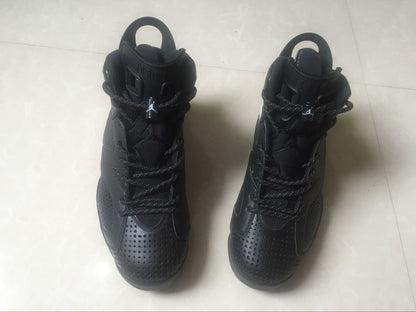 Front-facing view of the pair showing perforated toe boxes, tongues, laces, and padded collars.