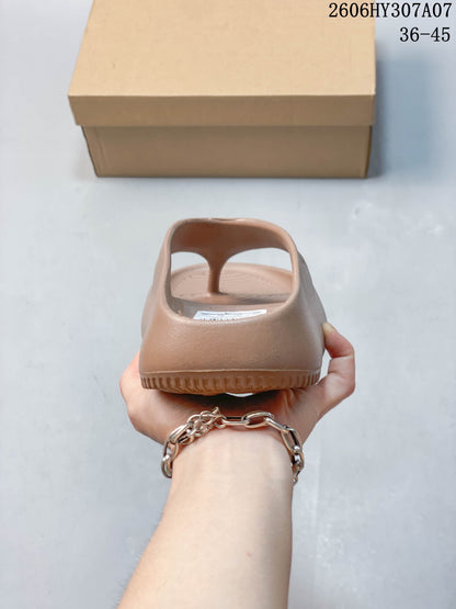 Nike Calm Slide Sandals in Taupe