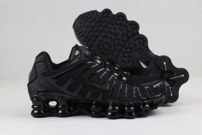 Nike Shox TL Sneakers in Black and Gold