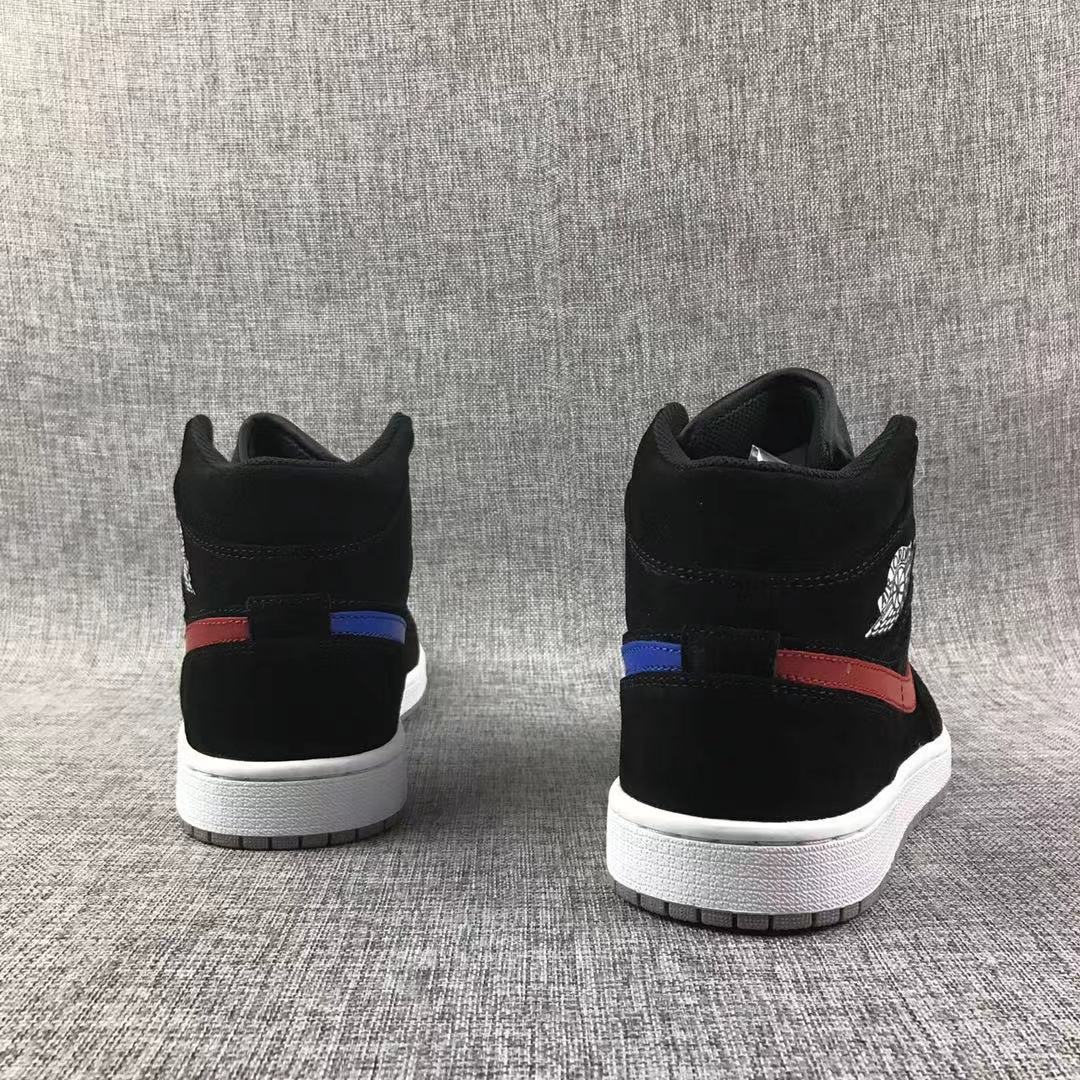 Rear view of the pair showing red and blue side details, black collars, and white midsoles.