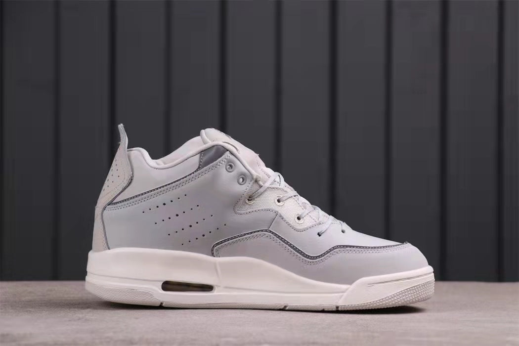 Side profile showing the low-top shape, perforated side panel, and visible sole window.