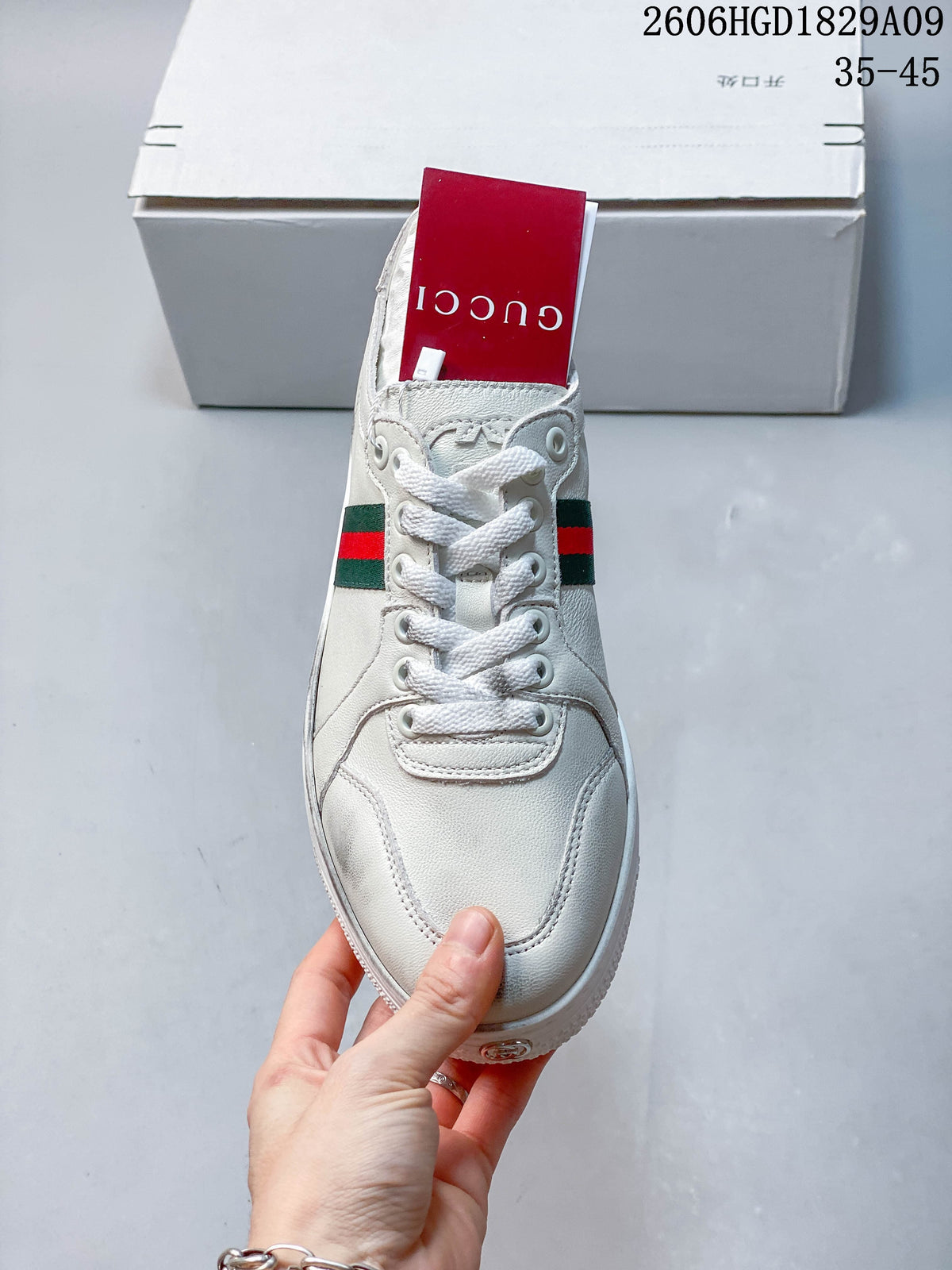 Gucci White Low-Top Sneakers with Red-Green Web Stripe