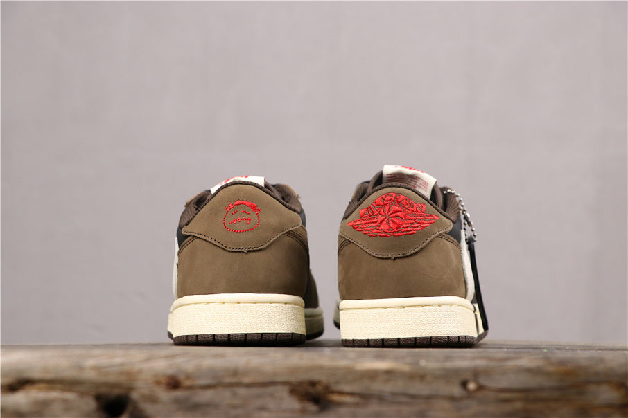 Straight-on rear view of both sneakers showing the brown heel sections and red embroidery.