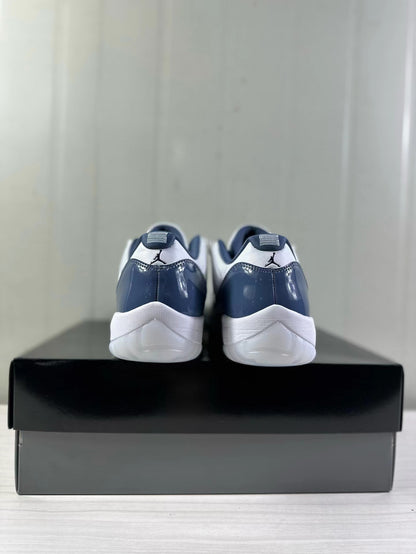 Rear view of the white and blue Jordan Air Jordan 11 Low sneakers