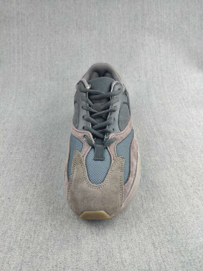 Top view showing the lace-up front, layered toe panels, and mesh-like tongue.
