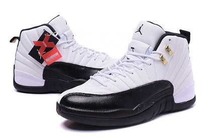 Three-quarter side view of the white and black pair with gold-tone lace hardware and attached hangtags.