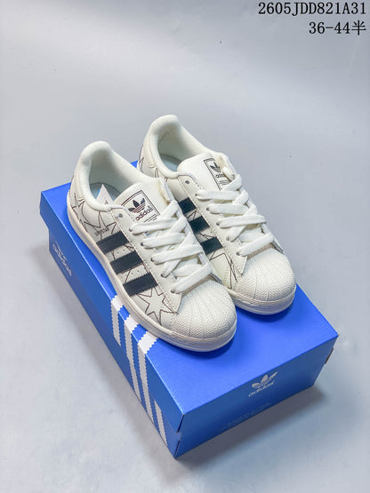 Adidas Superstar Shell-Toe Sneakers in White and Black