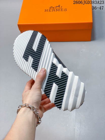Hermès Low-Top Sneakers in Navy and White