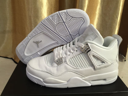 White Jordan 4 sneaker photographed with its patterned outsole facing upward beside the matching shoe.