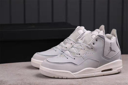 Pair of white and gray Jordan low-top sneakers shown from a front three-quarter angle.