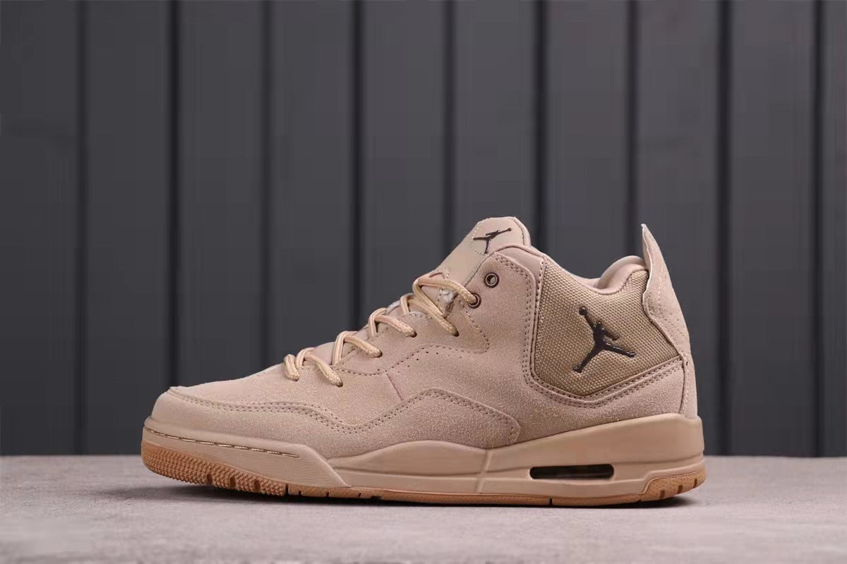 Side view of the pair highlighting the brown colorway, Jordan logos, and gum-colored outsole.