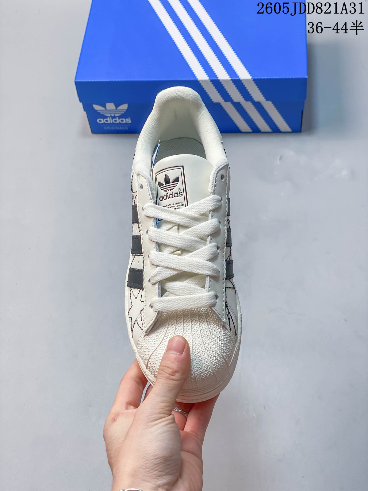Adidas Superstar White Sneakers with Black Stripes