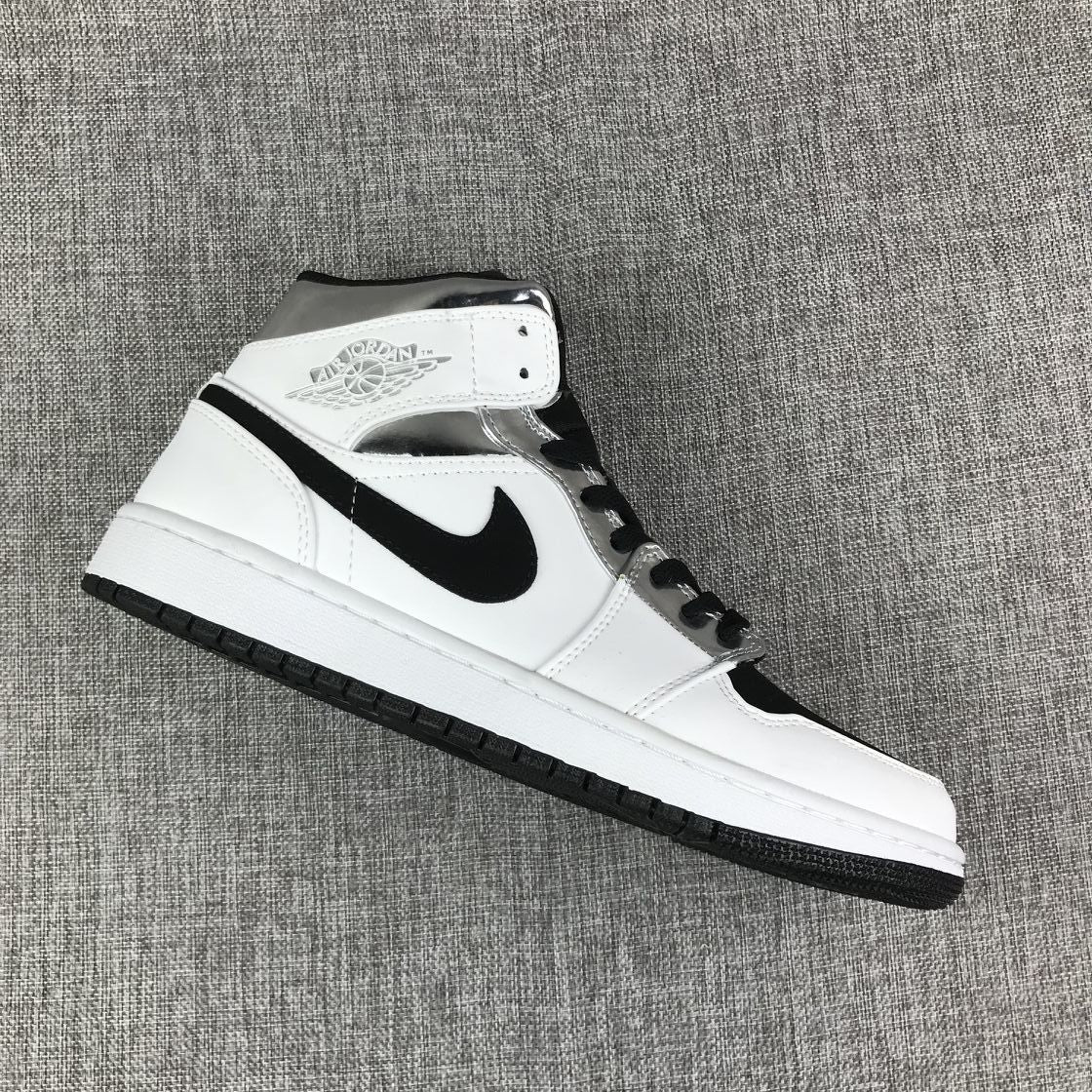 Angled side view of one sneaker showing the mid-top shape, black Swoosh, and white midsole.