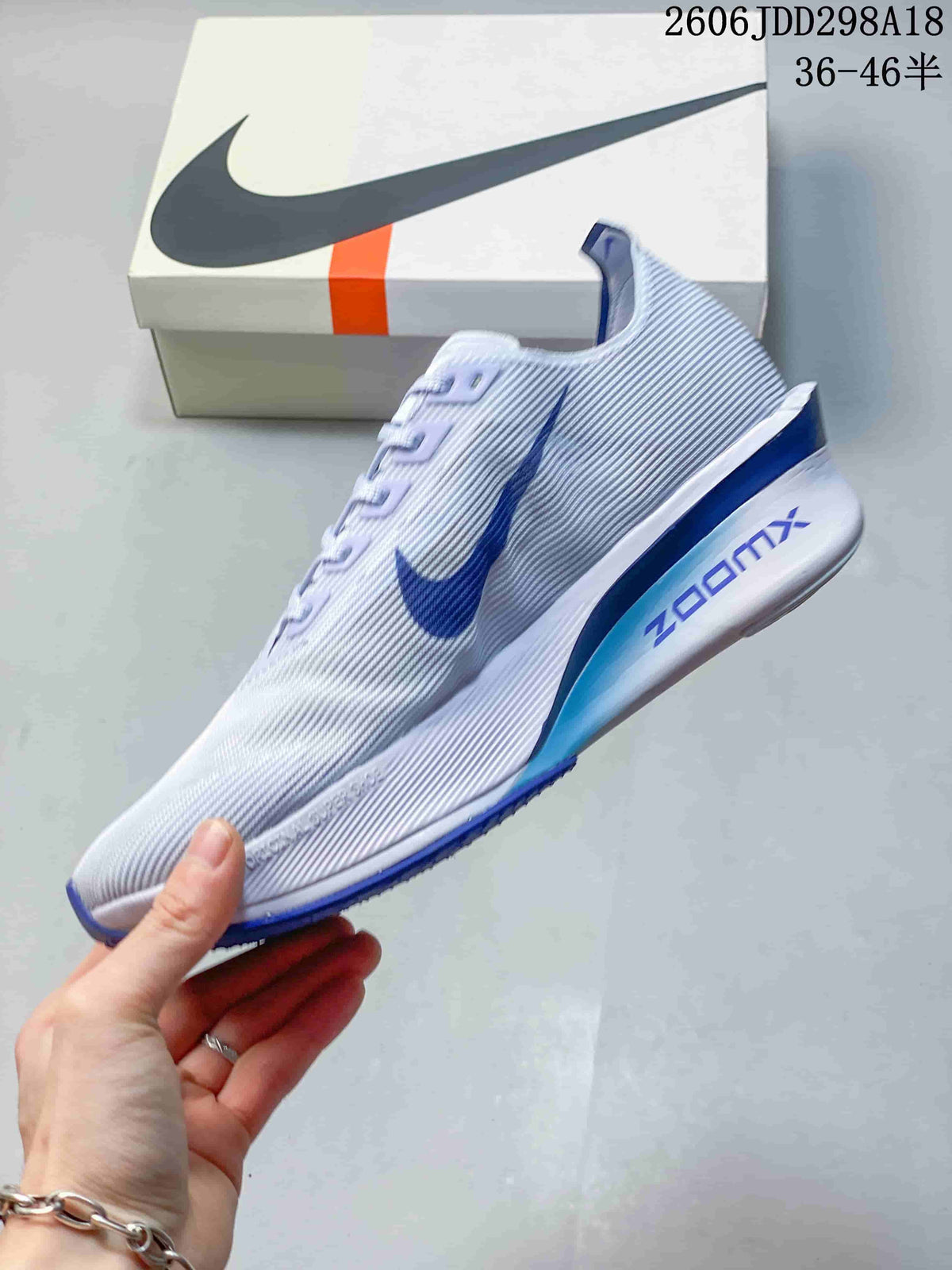 Nike ZoomX Vaporfly NEXT% 4 Road Racing Shoes, White and Blue