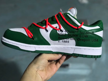 Side profile showing the low-top silhouette, green and white panels, red laces, and printed side text.
