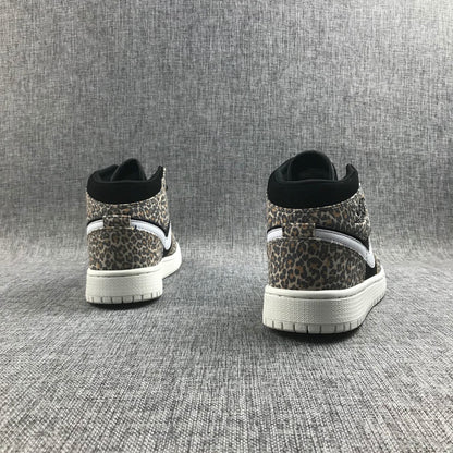 Rear view of the pair showing leopard-print heel panels, black collars, white Swoosh accents, and white outsoles.