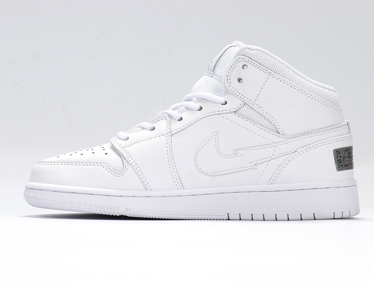 Side profile of a white high-top sneaker with a layered Swoosh and metallic heel detail.