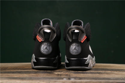 Rear view showing circular Paris-themed heel badges and red side tags.