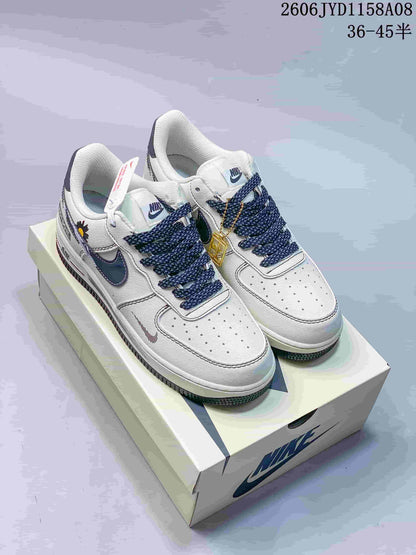 Nike Air Force 1 '07 Low Sneakers in White and Navy