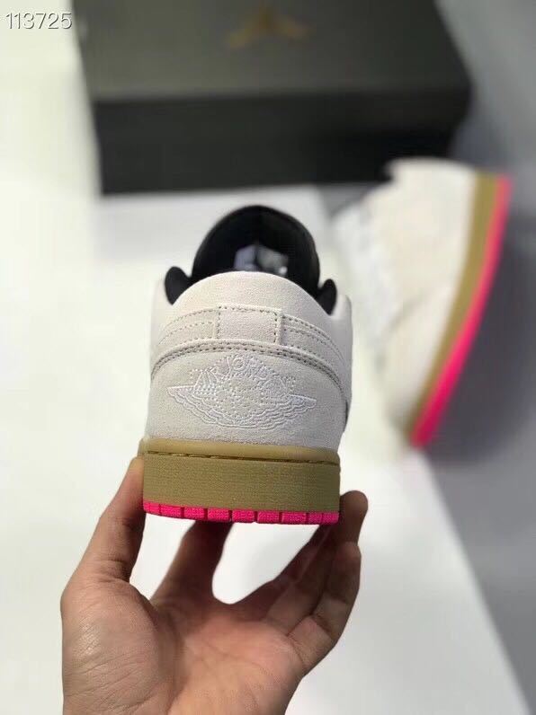Rear view showing the light gray heel, black collar lining, gum-colored midsole, and pink outsole.