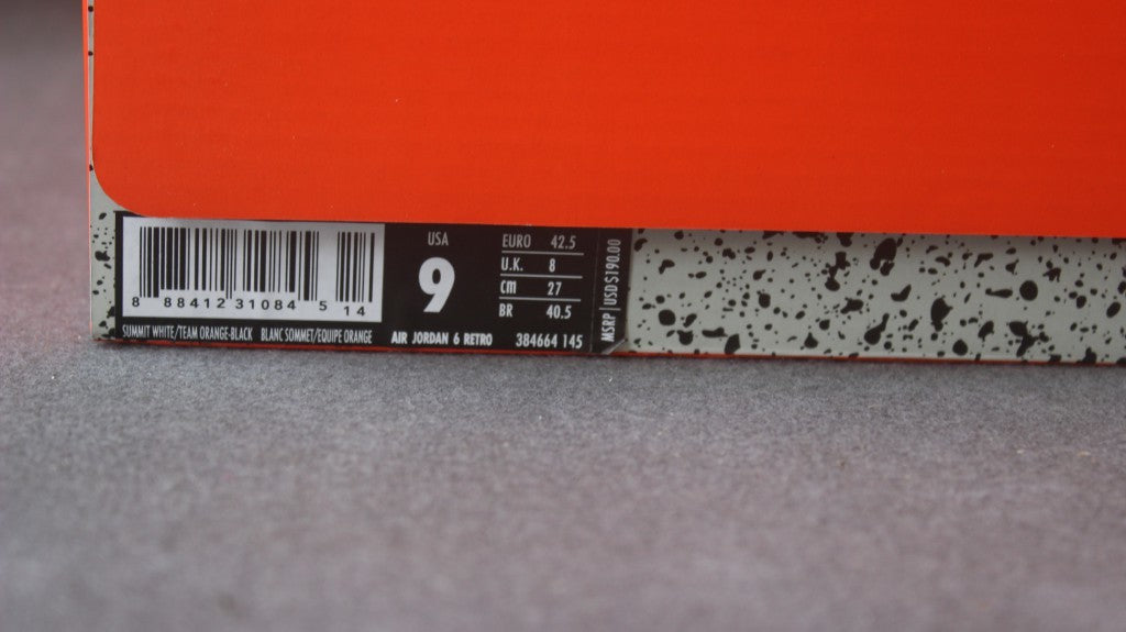 Close-up of the shoe box label showing US men's size 9, EU 42.5, 27 cm, and style code 384664-145.