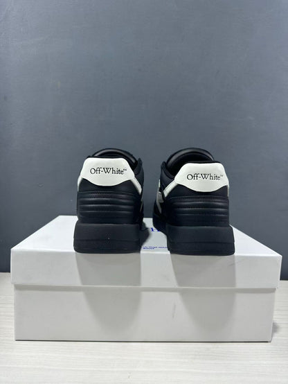 Rear view of the pair showing white branded heel panels and padded black heel sections.