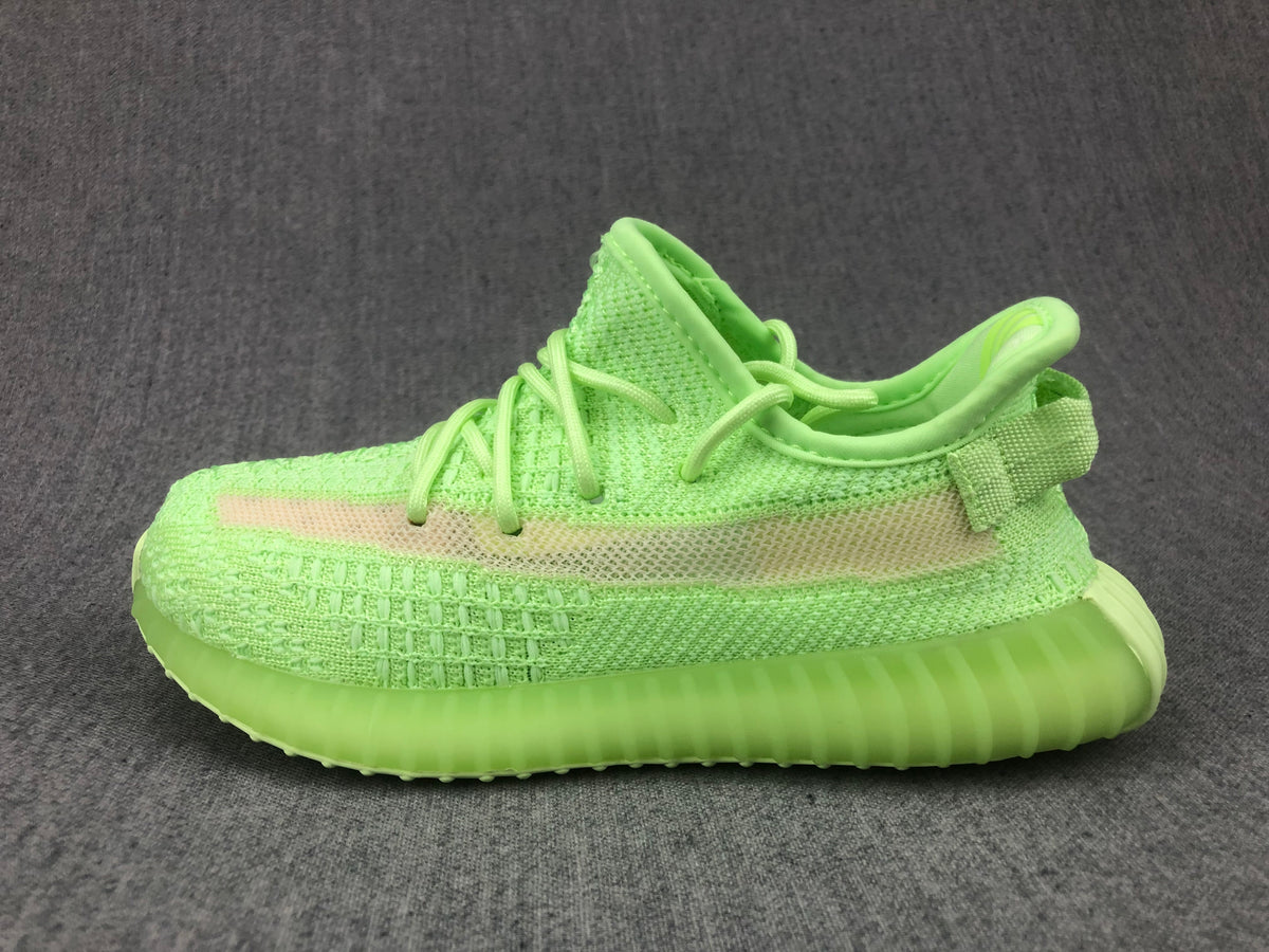 Side profile highlighting the low-top shape, side stripe, and translucent sole.