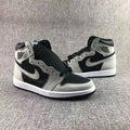 Front three-quarter view highlighting the high-top shape, contrasting overlays, and side Swoosh.