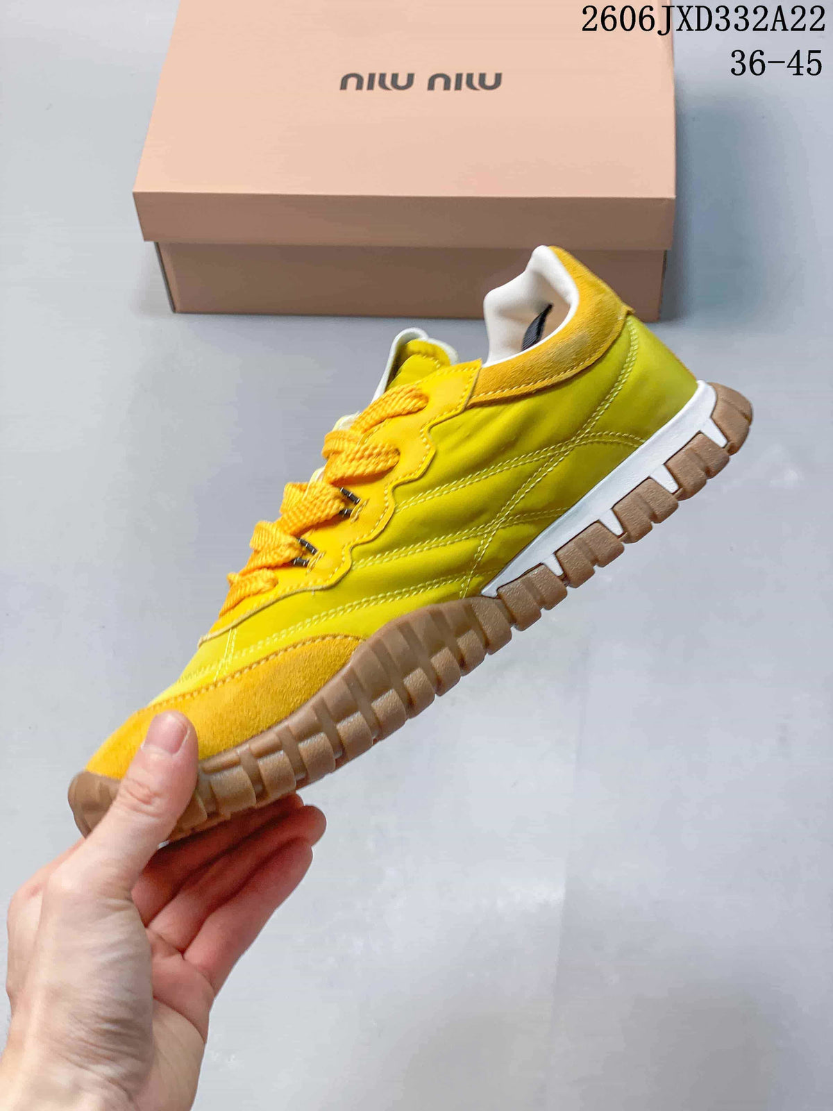 Miu Miu Tyre Low-Top Sneakers in Yellow