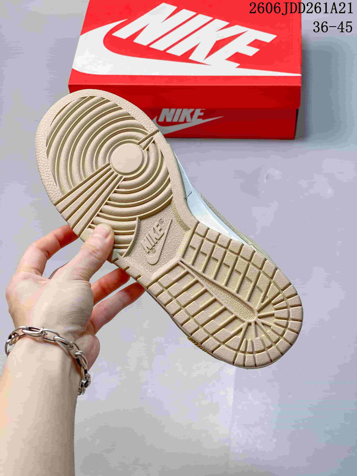 Nike Dunk Low Sneakers in White and Beige